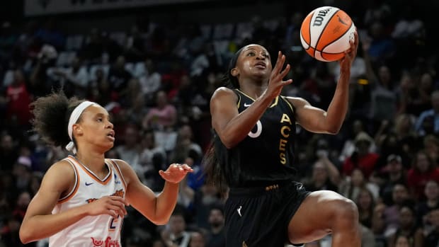 Jackie Young shooting a layup.